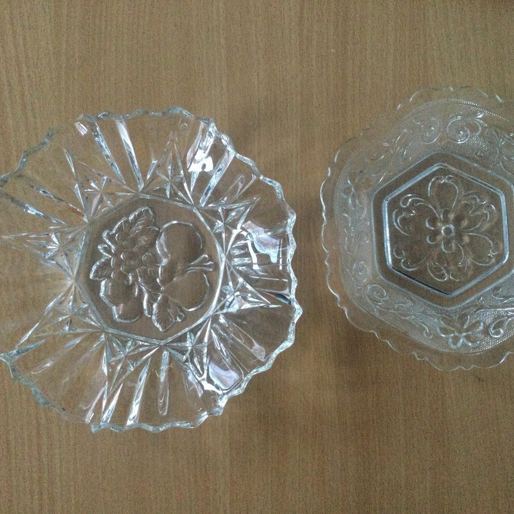 Two clear glass bowls dishes star fruit and flower design